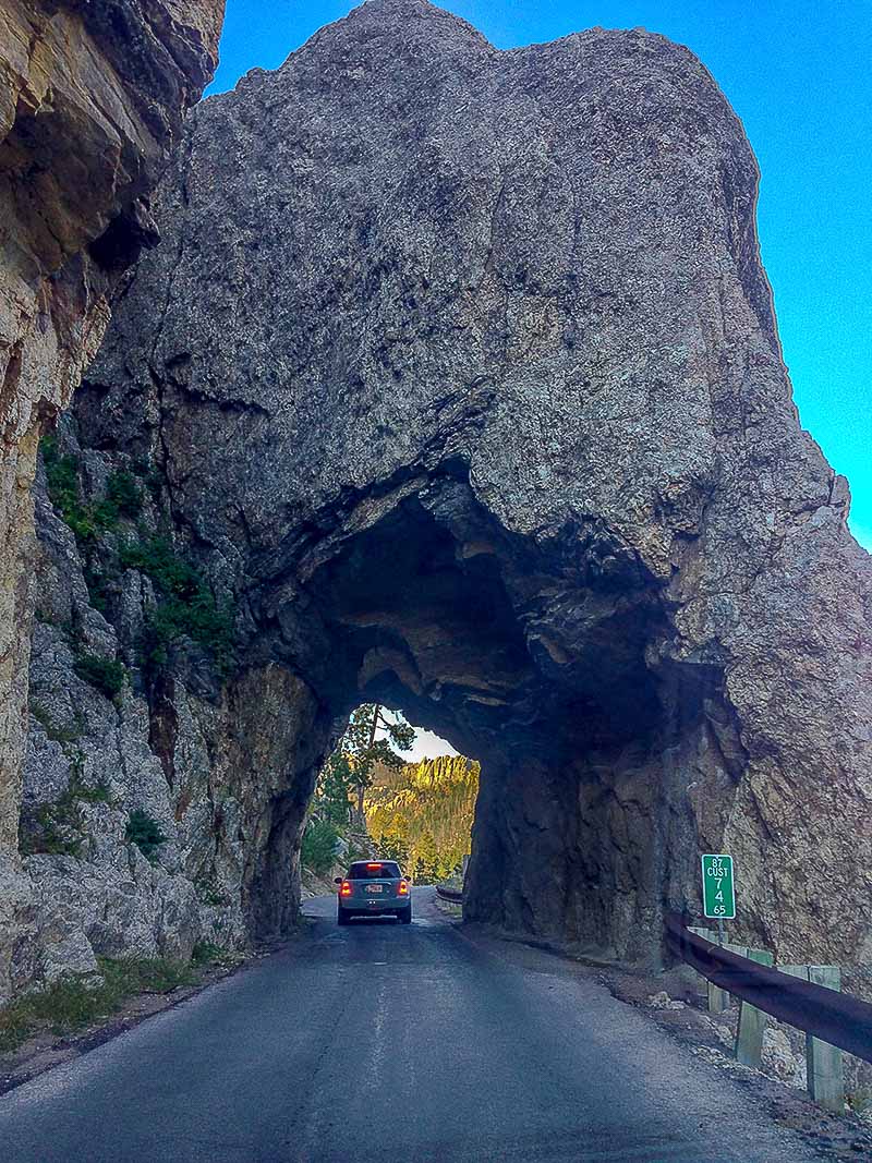 Rock tunnel carved through a Black Hills boulder on the Needles Highway, South Dakota