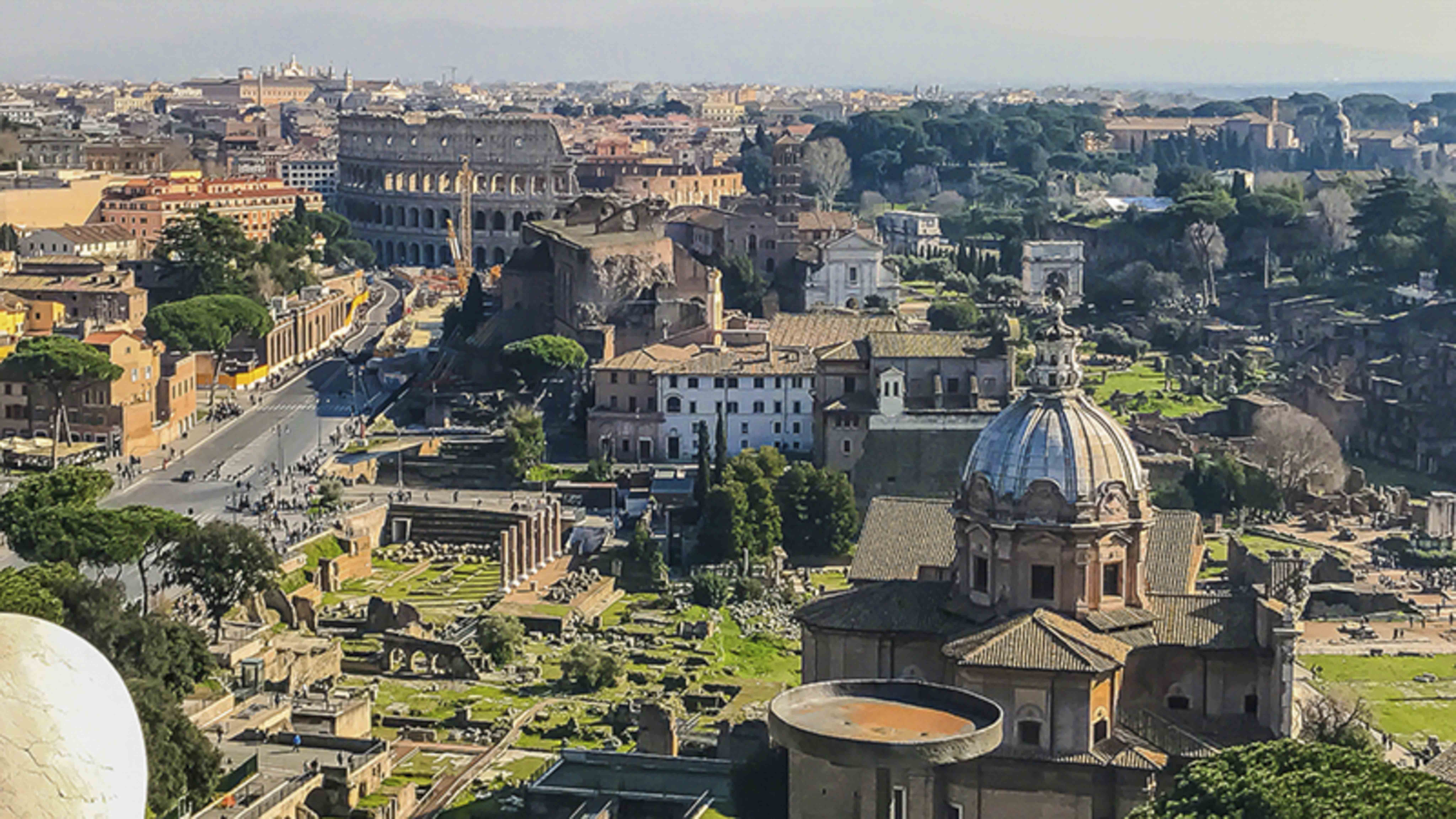 Rome from the top of the Vittoriano — the Colosseum and Roman Forum spread out below
