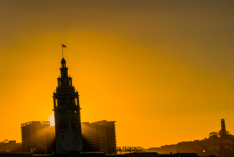 San Francisco Embarcadero at golden hour — city skyline and water