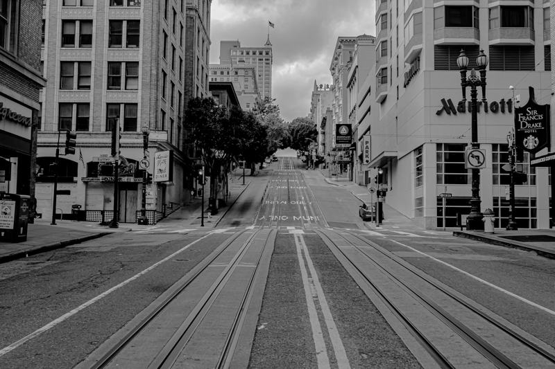 Chinatown gate standing guard over empty streets, April 2020