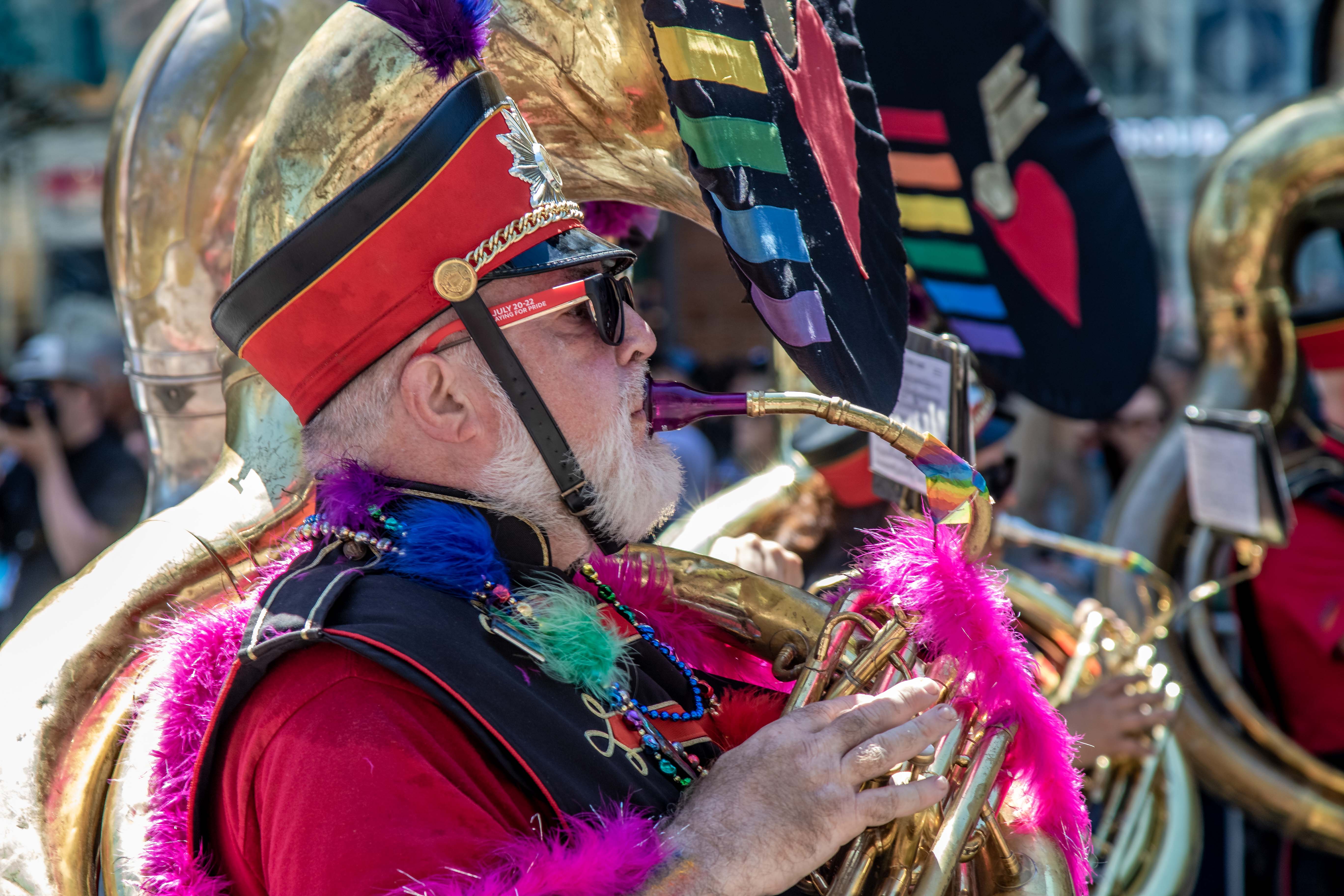 Freedom Band member playing flute in the parade