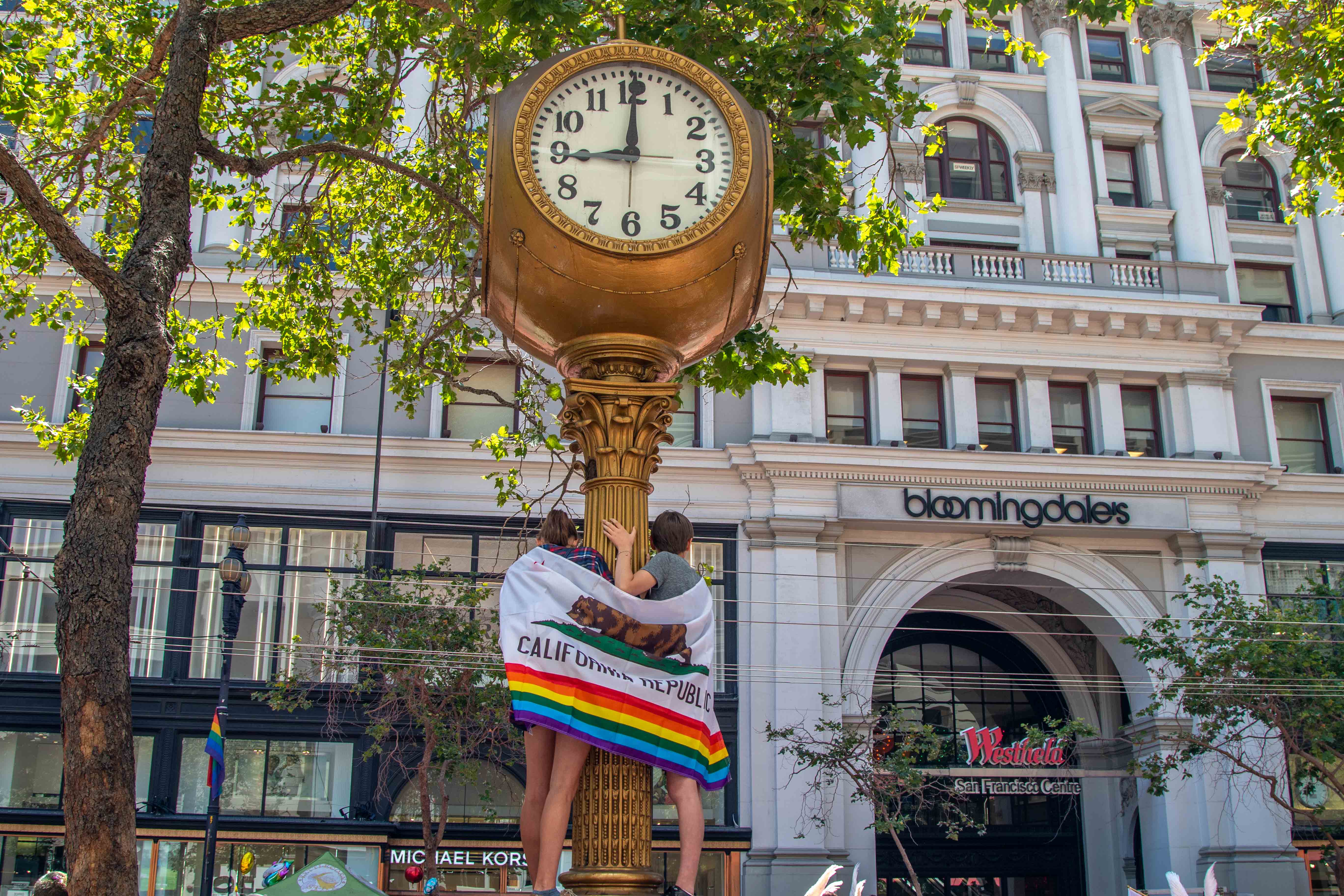 SF Pride — marching band and rainbow flags along Market Street