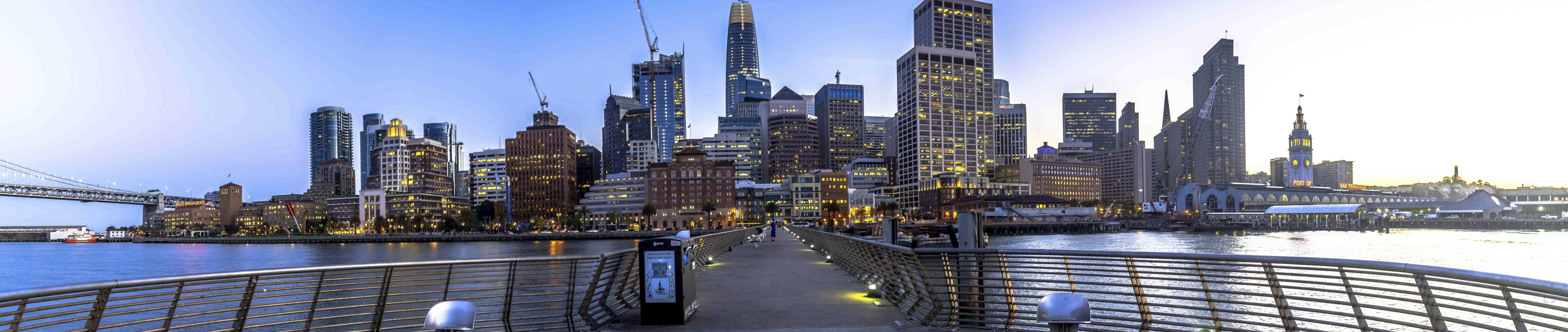 San Francisco skyline panorama at dusk from the Embarcadero pier
