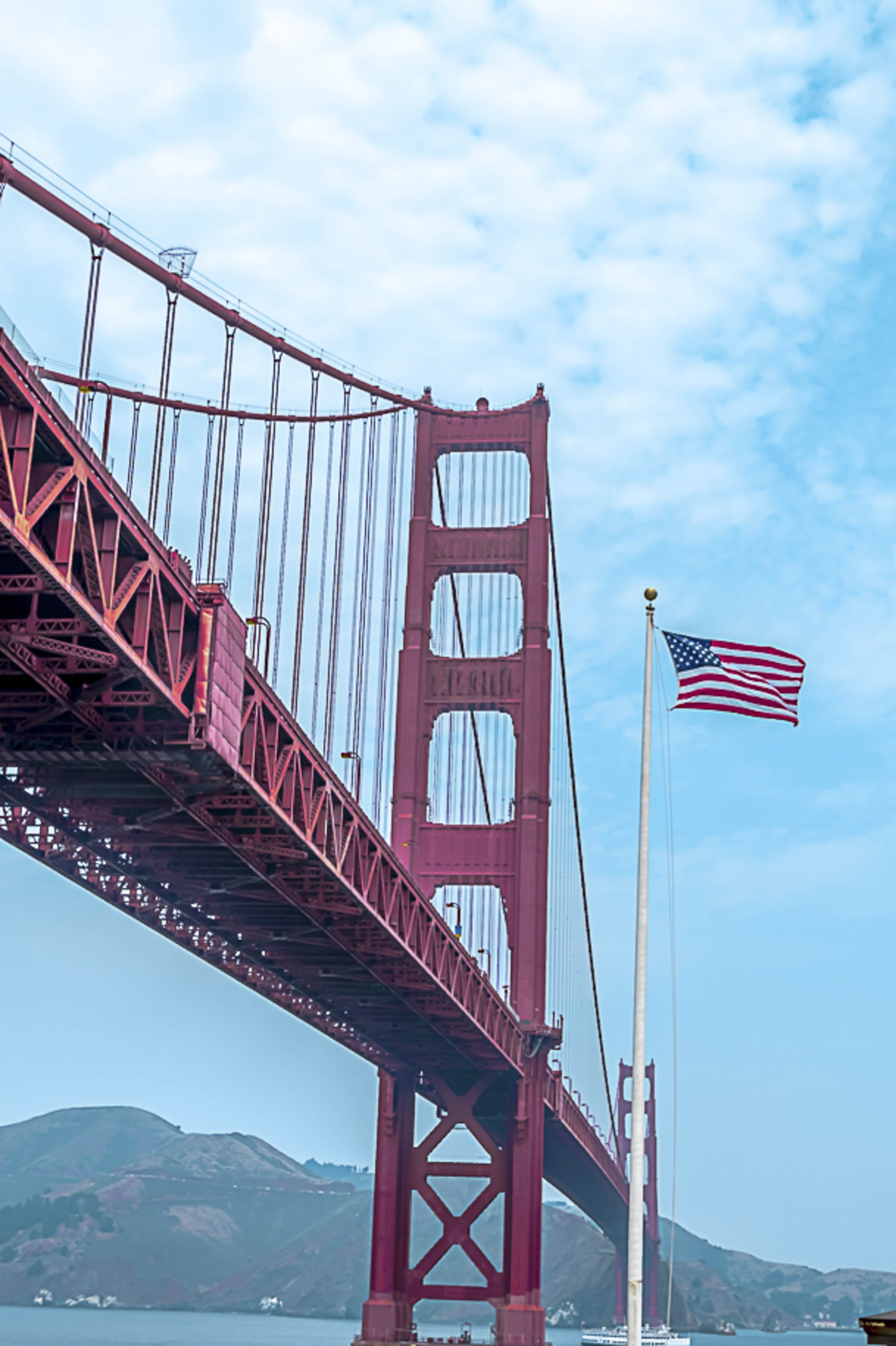 Golden Gate Bridge south tower with American flag