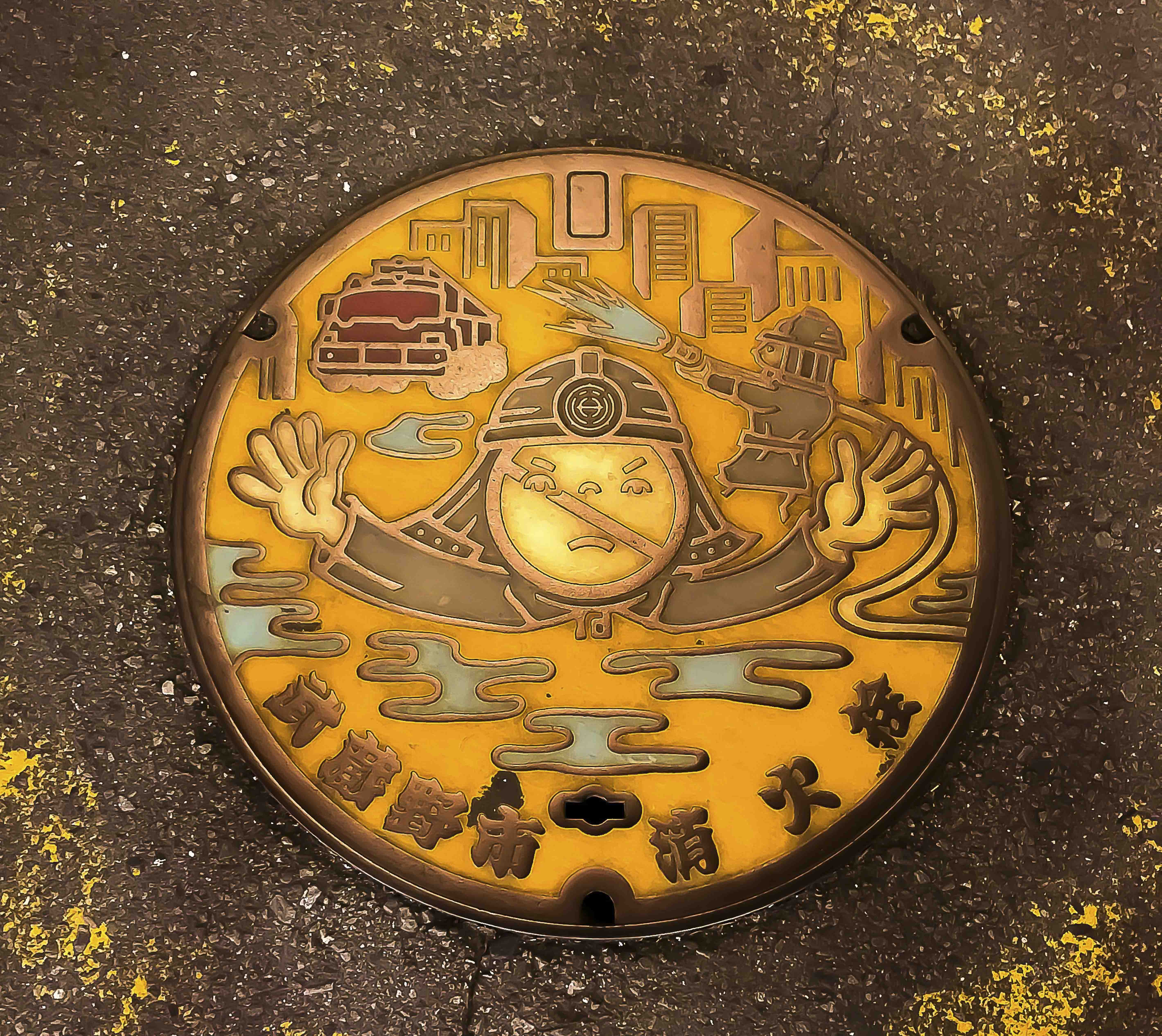 Decorative firefighter manhole cover — Tokyo's art underfoot