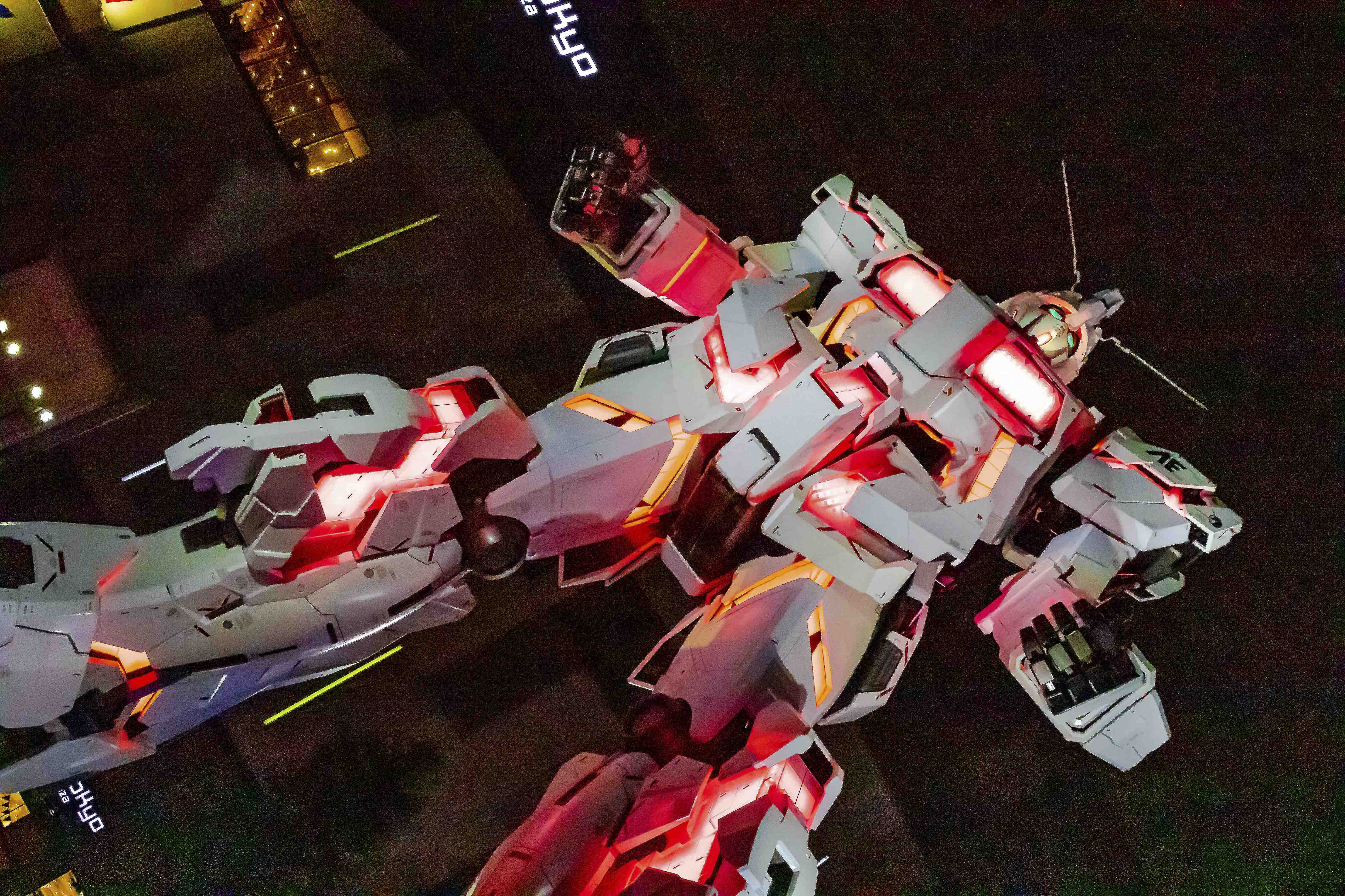 Unicorn Gundam statue at Odaiba — aerial view at night