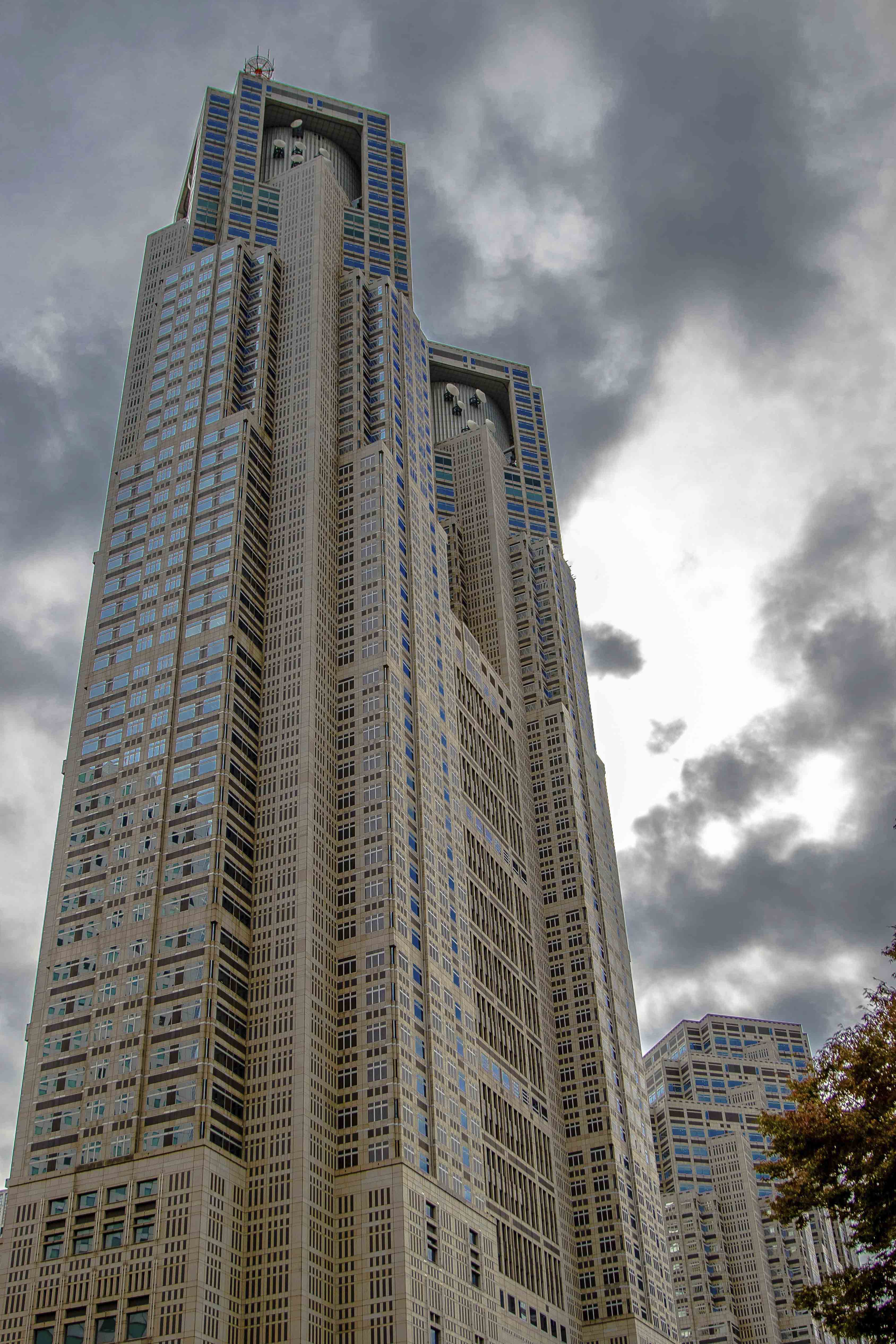 Tokyo Metropolitan Government Building under storm clouds