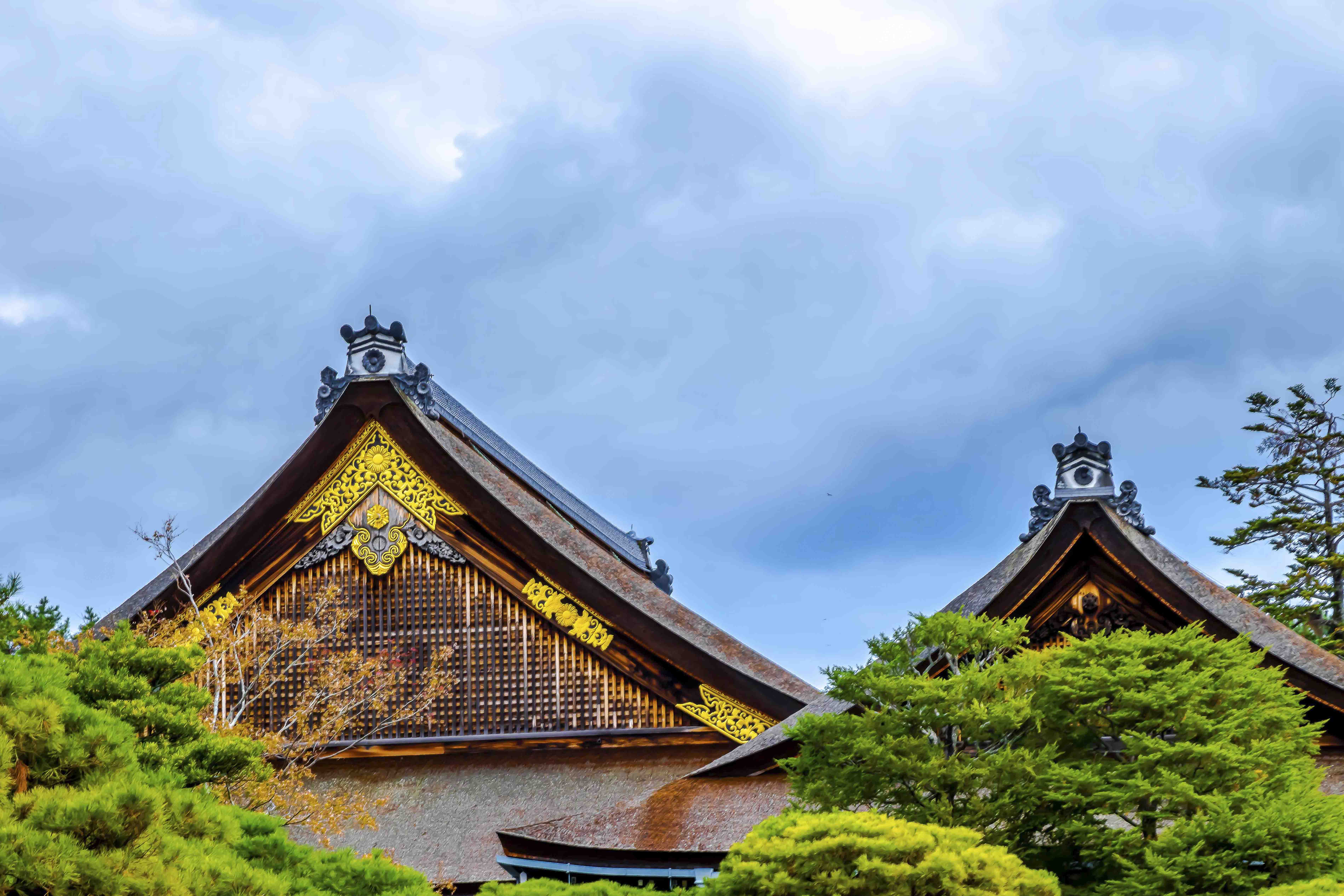 Imperial palace rooflines with gold gable ornamentation